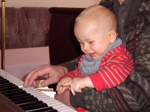 Playing 4 handed piano with my grandpa.